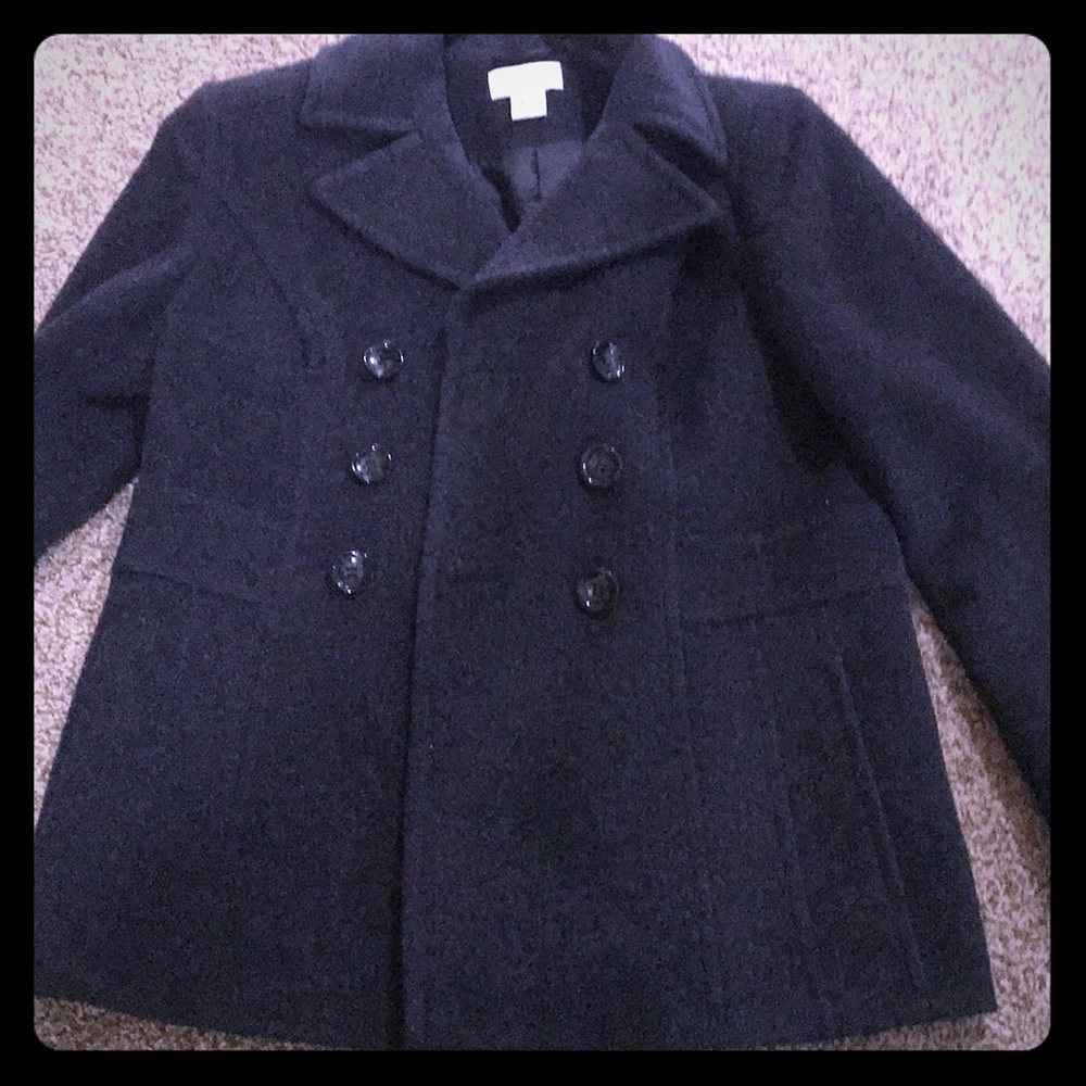 Classy Pea Coat with feminine flare to the back.